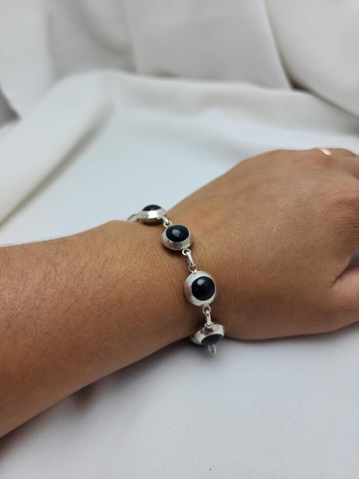 Pulsera Cìrrculo revers bco/negro